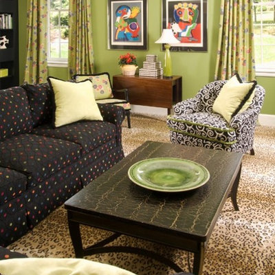 Living room - traditional living room idea in Charlotte with green walls