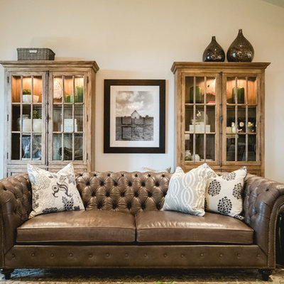 Living room - large country open concept medium tone wood floor living room idea in Oklahoma City with white walls, a standard fireplace and a stone fireplace