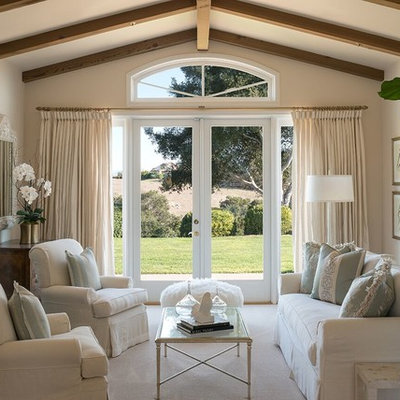 Living room - farmhouse living room idea in Santa Barbara with beige walls, a standard fireplace and a stone fireplace