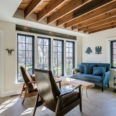 Living room - country light wood floor living room idea in Philadelphia with beige walls and no tv