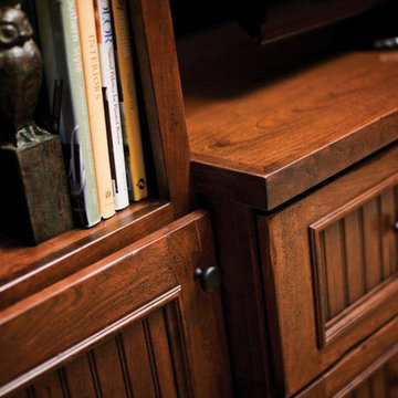Fashionable Built-in Entertainment Center Cabinetry with a Distressed Craftsman