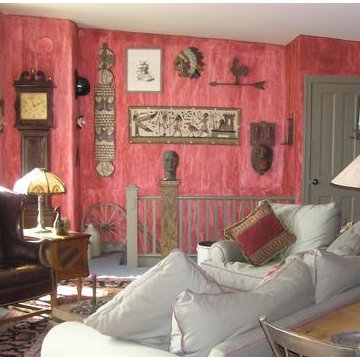 Faux Red Walls add Interest to Living Room