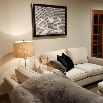 Feature tribal art showcased in formal lounge space