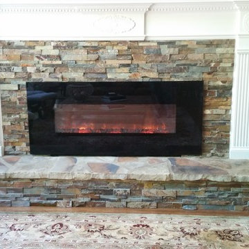 Fireplace Remodel with slate ledger stone and electric insert