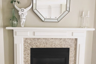 Small minimalist enclosed living room photo in Toronto with gray walls, a corner fireplace and a tile fireplace
