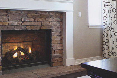 Living room - living room idea in Vancouver with a brick fireplace