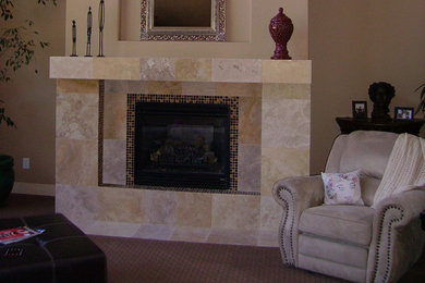 Inspiration for a carpeted living room remodel in Denver with beige walls, a standard fireplace and a tile fireplace