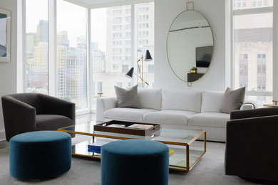 Foto di un soggiorno moderno con pareti bianche, parquet scuro e pavimento marrone