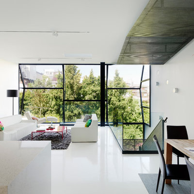 Inspiration for a contemporary open concept living room remodel in San Francisco with white walls