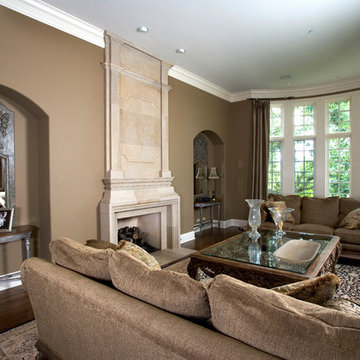 Floor to Ceiling Cut Limestone Fireplace Surround in Great Room
