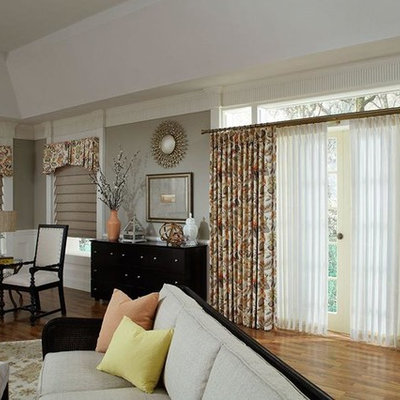 Living room - large transitional formal and open concept medium tone wood floor living room idea in Indianapolis with gray walls