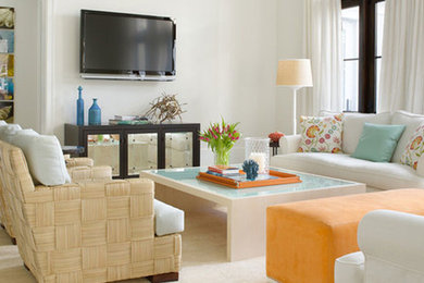 This is an example of a medium sized coastal open plan living room in DC Metro with white walls, painted wood flooring, no fireplace, a wall mounted tv and grey floors.