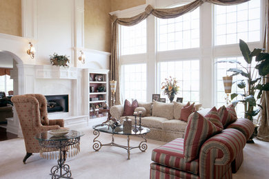 Inspiration for a large transitional formal and open concept carpeted and beige floor living room remodel in Indianapolis with beige walls, a standard fireplace and no tv