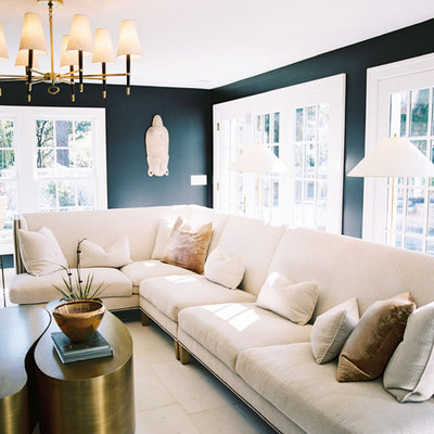 Living room - large contemporary open concept concrete floor living room idea in Other with black walls, a tv stand and no fireplace