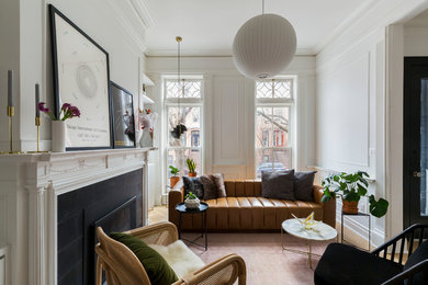 Living room - small transitional formal and enclosed light wood floor and beige floor living room idea in New York with white walls, a standard fireplace, a tile fireplace and no tv