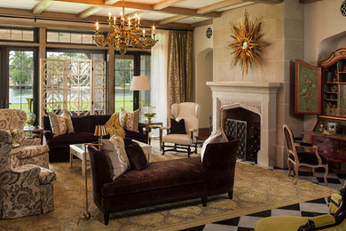 Example of a tuscan formal living room design in Miami with beige walls, a standard fireplace and no tv