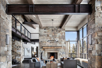 Inspiration for a large modern open concept and formal dark wood floor and brown floor living room remodel in Other with beige walls, a standard fireplace, a stone fireplace and no tv