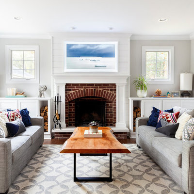 Inspiration for a mid-sized coastal formal living room remodel in Chicago with gray walls, a standard fireplace and a brick fireplace