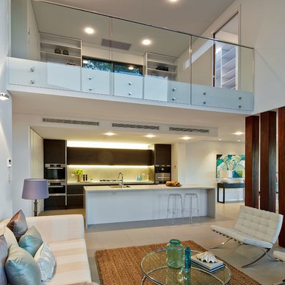 Large trendy open concept and formal living room photo in Sydney with white walls