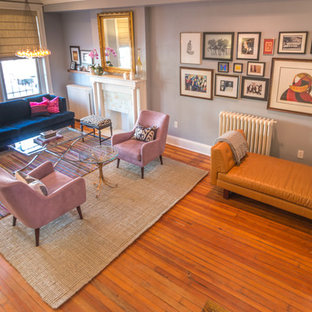 Living room - mid-sized eclectic formal and enclosed light wood floor living room idea in DC Metro with gray walls, a standard fireplace, a tile fireplace and no tv