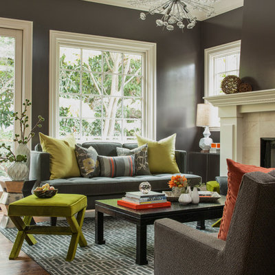 Example of a transitional living room design in San Francisco with brown walls