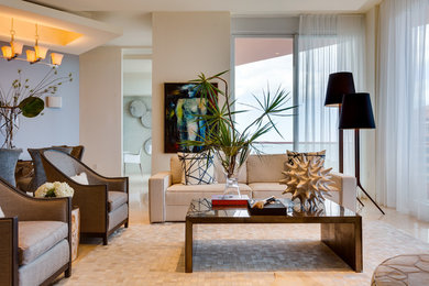 Trendy living room photo in Miami with beige walls