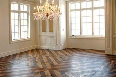 Inspiration for a mid-sized transitional medium tone wood floor living room remodel in Tampa