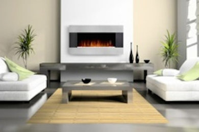 Example of a living room design in Toronto with white walls and a hanging fireplace
