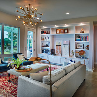Small transitional open concept concrete floor living room photo in Dallas with gray walls, no fireplace and a wall-mounted tv
