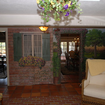 Garden Sunroom With Trompe-l'oeil Painting Walls & Trellis Over Mirror