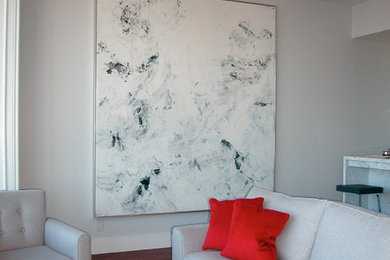 Example of a large classic formal and loft-style dark wood floor living room design in Montreal with gray walls, no fireplace and no tv