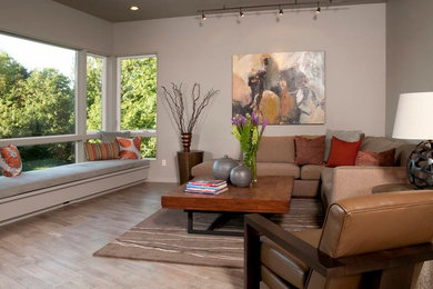 Mid-sized trendy formal and open concept laminate floor and gray floor living room photo in Seattle with gray walls