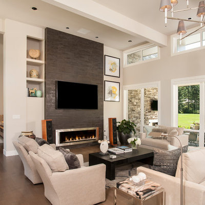 Example of a trendy formal and open concept dark wood floor and brown floor living room design in Seattle with beige walls, a ribbon fireplace, a tile fireplace and a wall-mounted tv