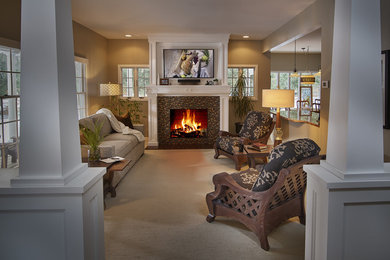 Inspiration for a mid-sized craftsman open concept carpeted and beige floor living room remodel in Other with gray walls, a standard fireplace, a tile fireplace and a media wall