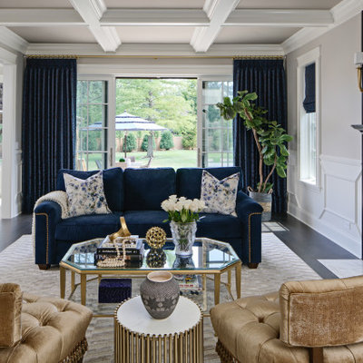 Example of a large transitional formal and open concept dark wood floor and brown floor living room design in Chicago with beige walls, a standard fireplace and a stone fireplace