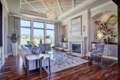 Inspiration for a large transitional formal and open concept dark wood floor living room remodel in Kansas City with beige walls, a standard fireplace and a concrete fireplace