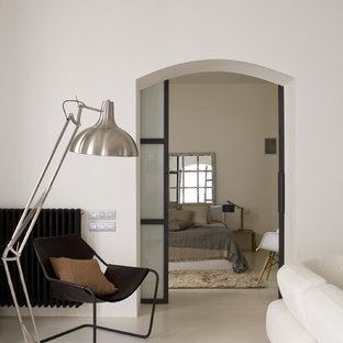Ispirazione per un soggiorno minimal con pareti bianche e pavimento bianco