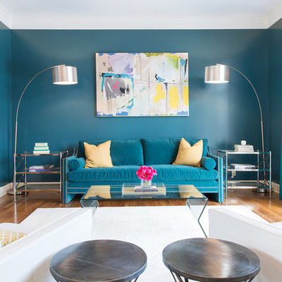 Mid-sized trendy medium tone wood floor living room photo in Kansas City with green walls