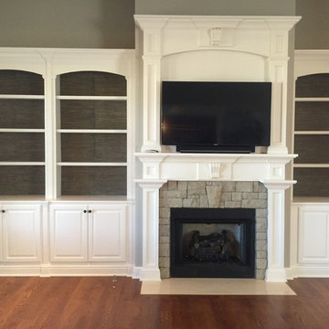 Grasscloth in the bookcase adds much interest and dimension