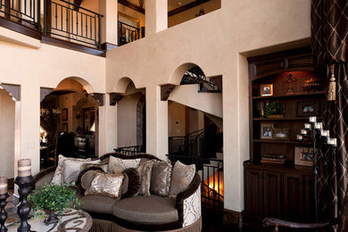 Example of a tuscan living room design in Kansas City
