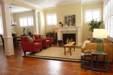 Mid-sized trendy open concept dark wood floor and brown floor living room photo in Denver with beige walls, a standard fireplace and a tile fireplace