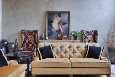 Immagine di un grande soggiorno contemporaneo aperto con pareti beige, parquet chiaro, camino classico e cornice del camino in pietra