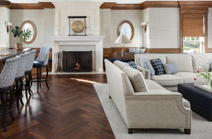 Living room - huge transitional enclosed medium tone wood floor and brown floor living room idea in Newark with a bar, gray walls, a standard fireplace, a stone fireplace and a media wall