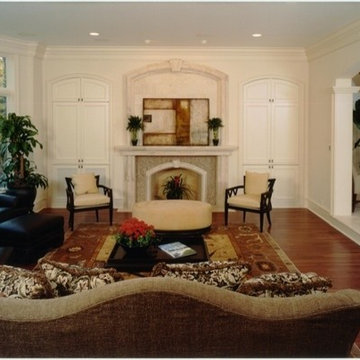 Great Room with Custom Cabinets and Limestone Fireplace