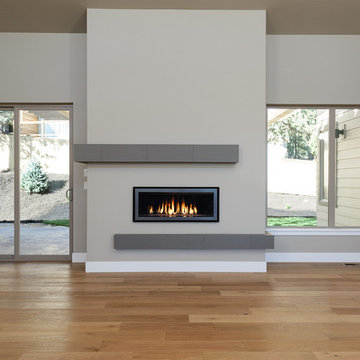 Great room with wall mounted fireplace