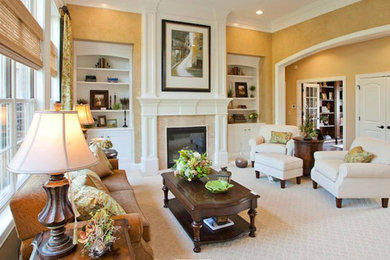 Large formal and open concept carpeted living room photo in Cincinnati with beige walls, a standard fireplace, a stone fireplace and no tv