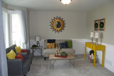 Example of a mid-sized classic formal and enclosed carpeted living room design in Other with gray walls and no tv
