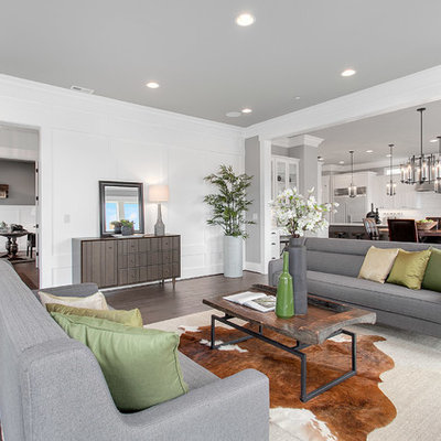 Inspiration for a large transitional open concept and formal medium tone wood floor living room remodel in Seattle with gray walls and no tv