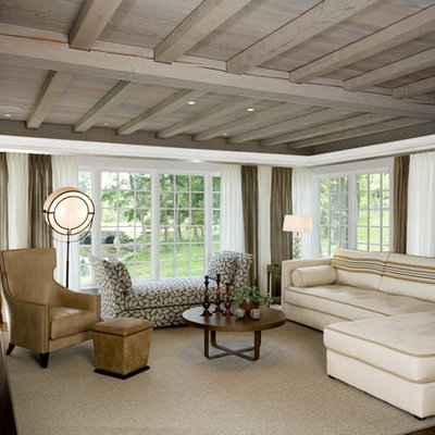 Inspiration for a large contemporary enclosed dark wood floor and brown floor living room remodel in New York with white walls, a wall-mounted tv and no fireplace