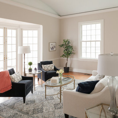 Example of a mid-sized transitional formal and enclosed light wood floor living room design in Bridgeport with white walls